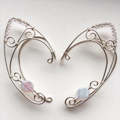 Silver elf ear cuffs with iridescen..